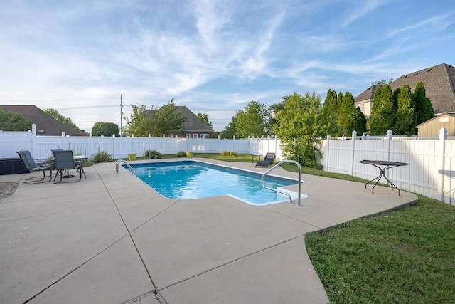view of swimming pool featuring a fenced backyard, a fenced in pool, and a patio