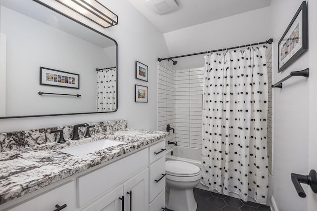 bathroom featuring shower / bath combo, tile patterned flooring, vanity, toilet, and vaulted ceiling