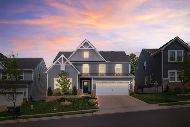craftsman house featuring a garage, a standing seam roof, board and batten siding, concrete driveway, and a lawn