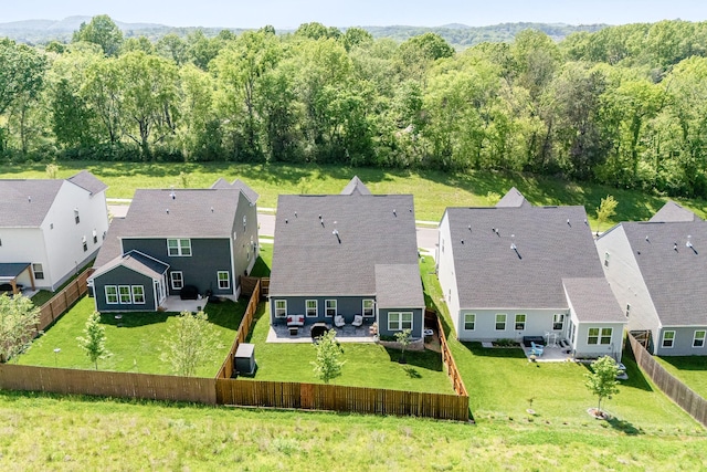 aerial view with a residential view and a forest view