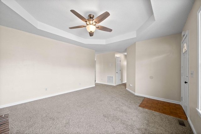 3844 Marla Cir, Clarksville, TN 37042 - carpeted empty room with visible vents, ceiling fan, a tray ceiling, and baseboards