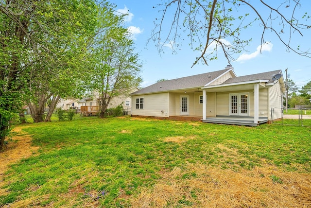 3844 Marla Cir, Clarksville, TN 37042 - back of property featuring a lawn, french doors, and a fenced backyard