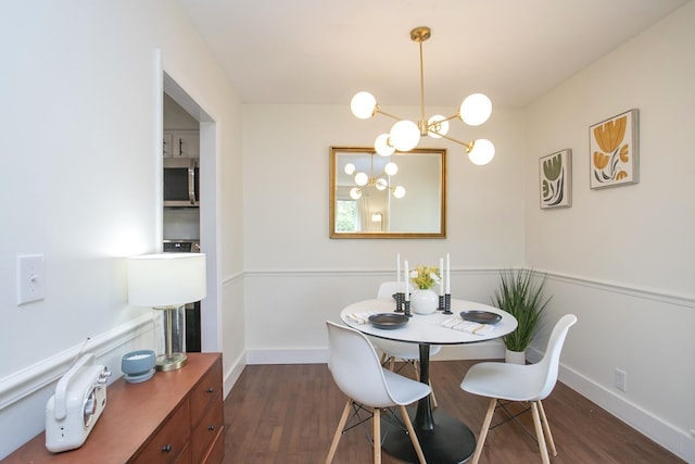 3901 Whitland Ave # 11, Nashville, TN 37205 - dining space with dark wood-style flooring and a notable chandelier