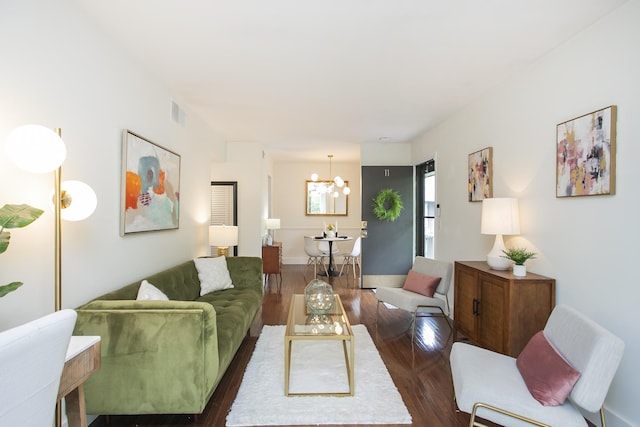 3901 Whitland Ave # 11, Nashville, TN 37205 - living area with a chandelier, visible vents, and dark wood-style floors