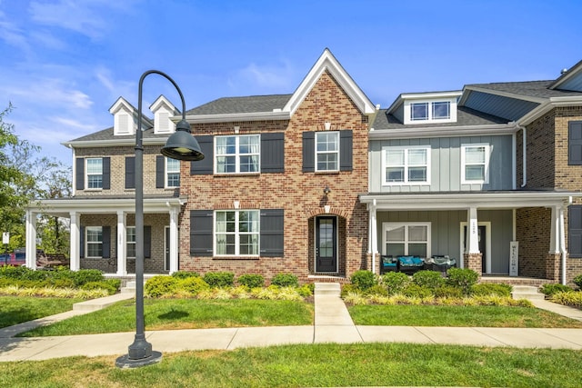 123 Saddlewood Ln, Hendersonville, TN 37075 - view of property with brick siding, board and batten siding, and covered porch