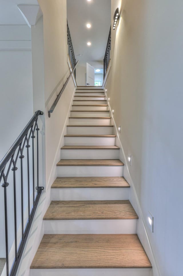 stairs with recessed lighting