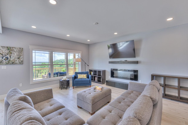 living room featuring recessed lighting and wood finished floors
