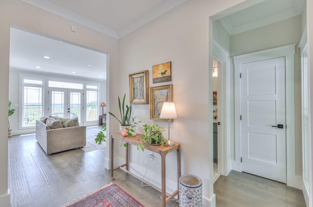 hall featuring wood finished floors, french doors, recessed lighting, and baseboards
