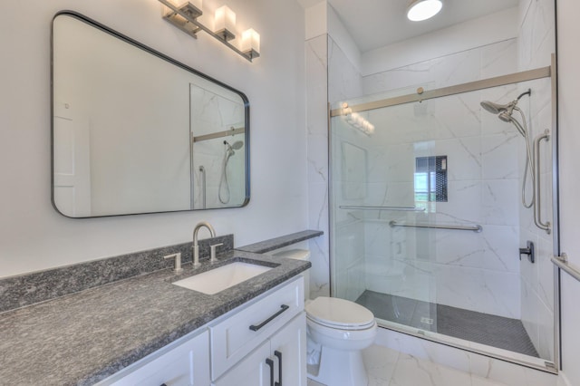 bathroom featuring a marble finish shower, marble finish floor, toilet, and vanity
