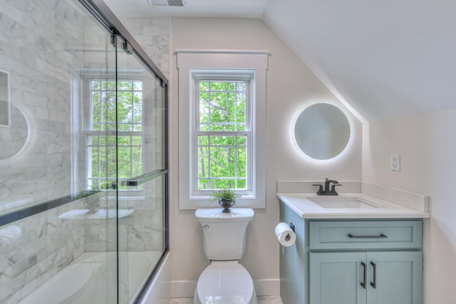 full bath with vanity, toilet, enclosed tub / shower combo, baseboards, and lofted ceiling