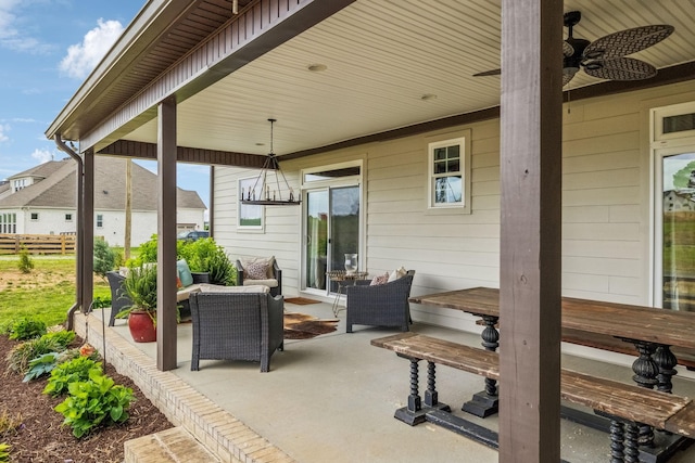 view of patio / terrace with ceiling fan, fence, and an outdoor hangout area