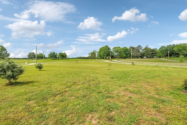 surrounding community with a yard