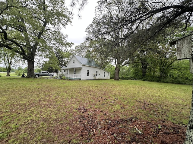 view of yard with covered porch