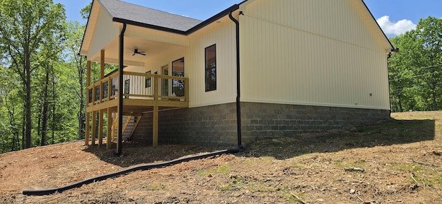 2775 Mayne Trace Rd, Waverly, TN 37185 - view of property exterior with roof with shingles, a ceiling fan, and a wooden deck