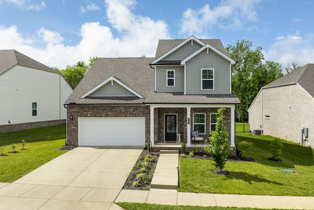 2137 Creekland View Blvd, Nashville, TN 37207 - craftsman house with a porch, a garage, board and batten siding, a shingled roof, and driveway