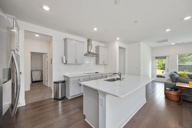 2137 Creekland View Blvd, Nashville, TN 37207 - kitchen featuring a sink, wall chimney exhaust hood, freestanding refrigerator, black electric stovetop, and dark wood-type flooring