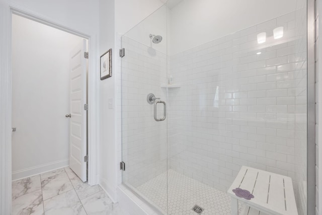2137 Creekland View Blvd, Nashville, TN 37207 - full bathroom featuring a shower stall, marble finish flooring, and baseboards