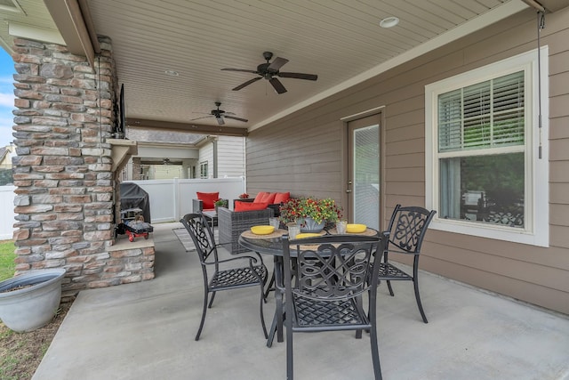 view of patio / terrace with outdoor dining space, ceiling fan, a grill, and fence
