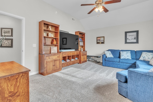 living area with ceiling fan, visible vents, baseboards, vaulted ceiling, and light carpet