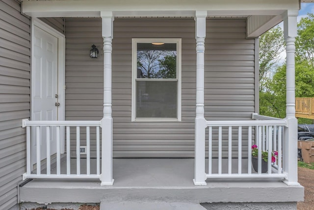 entrance to property with covered porch