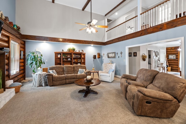 209 Green Valley Blvd, Franklin, TN 37064 - living room featuring ceiling fan, visible vents, baseboards, a high ceiling, and carpet flooring