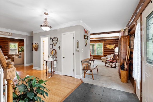 209 Green Valley Blvd, Franklin, TN 37064 - foyer featuring dark tile patterned flooring, baseboards, crown molding, and rustic walls