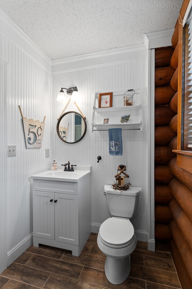 209 Green Valley Blvd, Franklin, TN 37064 - half bathroom featuring vanity, wood tiled floor, crown molding, and toilet