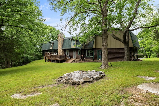209 Green Valley Blvd, Franklin, TN 37064 - back of house with a chimney, a wooden deck, a yard, and log exterior