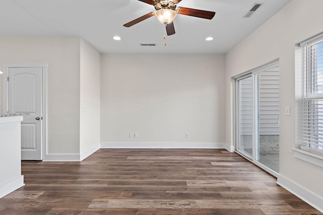 spare room with recessed lighting, a ceiling fan, visible vents, and wood finished floors