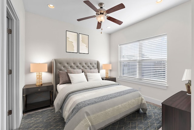 bedroom with ceiling fan, recessed lighting, and baseboards