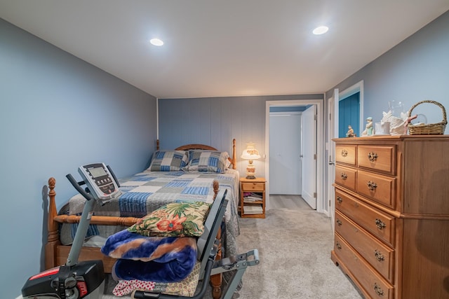 bedroom with recessed lighting and light carpet