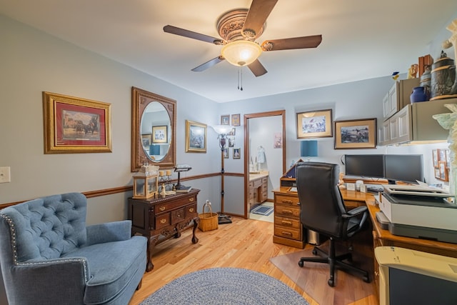office area featuring a ceiling fan and light wood-style floors