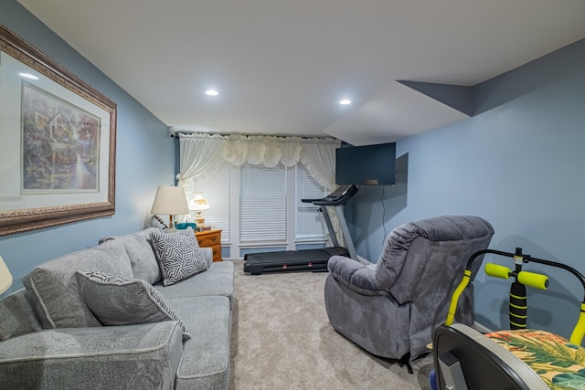 carpeted living area with recessed lighting