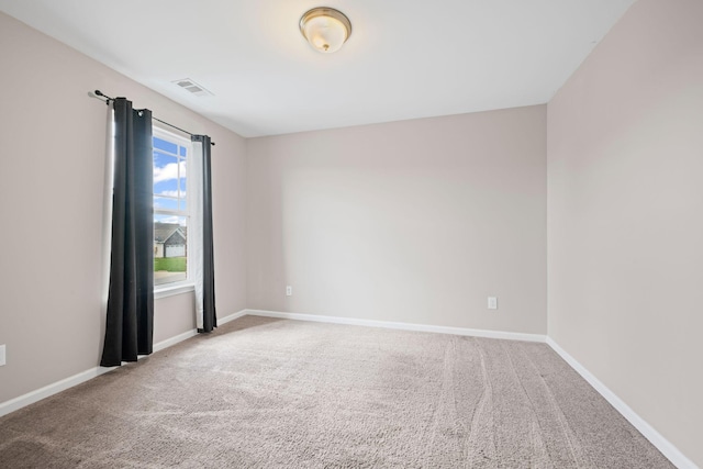 208 Wyburn Pl, Burns, TN 37029 - spare room with carpet floors, baseboards, and visible vents