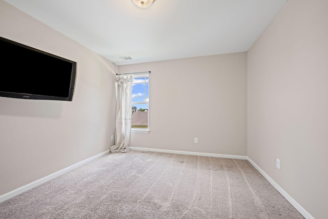 208 Wyburn Pl, Burns, TN 37029 - carpeted spare room featuring baseboards and visible vents