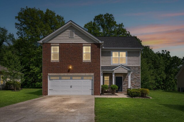 208 Wyburn Pl, Burns, TN 37029 - traditional-style house with central air condition unit, an attached garage, stone siding, a lawn, and driveway