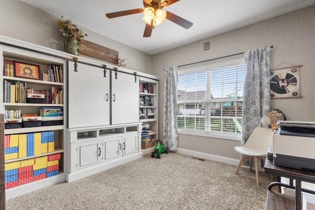 game room featuring baseboards, a ceiling fan, carpet flooring, and visible vents