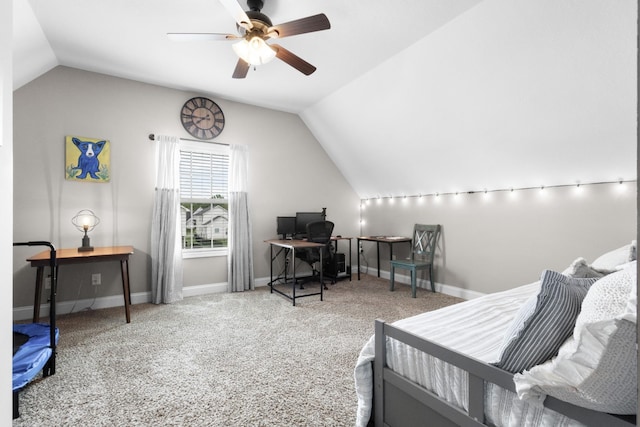 carpeted bedroom featuring baseboards, vaulted ceiling, and ceiling fan