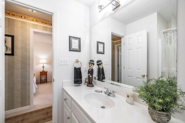 bathroom with a shower with curtain and vanity