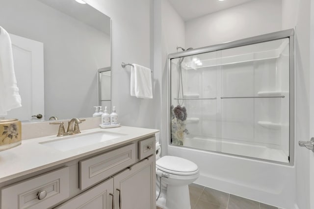 1072 Sumner Grv, Spring Hill, TN 37174 - full bathroom with vanity, tile patterned flooring, enclosed tub / shower combo, and toilet