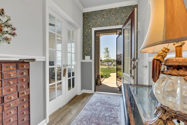 1072 Sumner Grv, Spring Hill, TN 37174 - doorway to outside with french doors, baseboards, wallpapered walls, wood finished floors, and ornamental molding