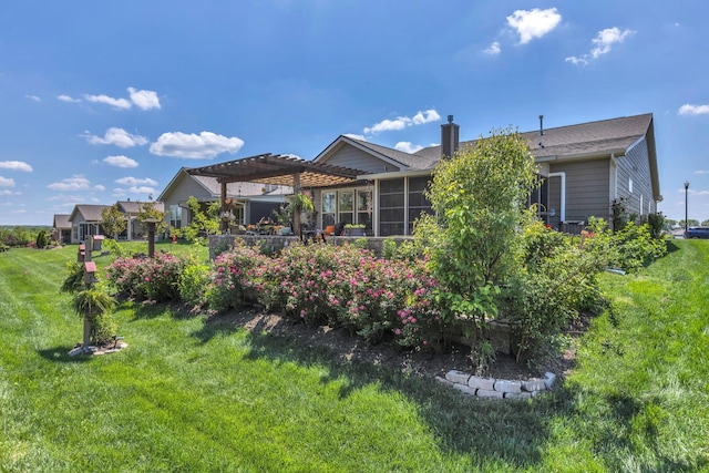 1072 Sumner Grv, Spring Hill, TN 37174 - rear view of property with a yard, a pergola, a chimney, and a sunroom