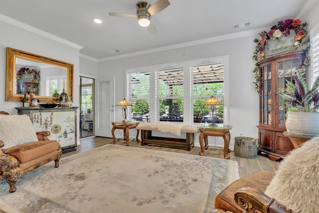 1072 Sumner Grv, Spring Hill, TN 37174 - living area featuring ceiling fan, visible vents, wood finished floors, ornamental molding, and recessed lighting