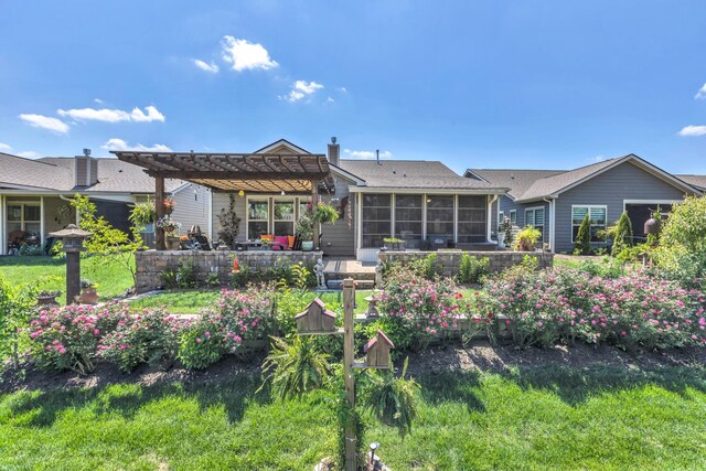 1072 Sumner Grv, Spring Hill, TN 37174 - back of house with a yard, a pergola, a chimney, and a sunroom