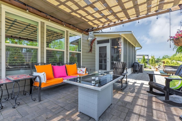 1072 Sumner Grv, Spring Hill, TN 37174 - view of patio featuring a sunroom and outdoor lounge area