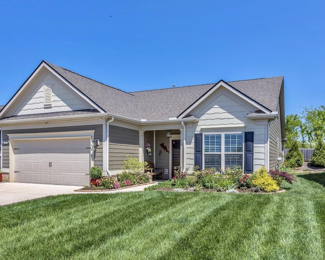 1072 Sumner Grv, Spring Hill, TN 37174 - view of front of property with a front yard, driveway, an attached garage, and roof with shingles