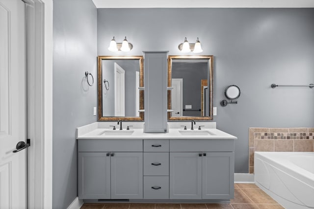 1341 Judge Tyler Dr, Clarksville, TN 37043 - full bathroom with a bath, double vanity, a sink, and tile patterned floors