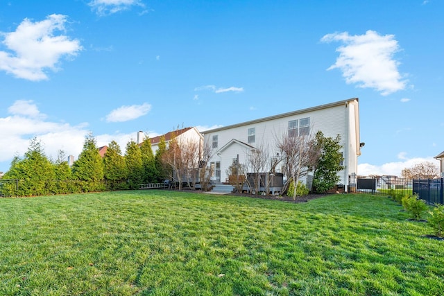 1341 Judge Tyler Dr, Clarksville, TN 37043 - back of house with fence, a wooden deck, and a yard