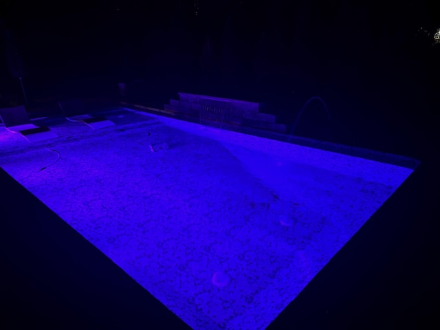 3715 Ivanora Dr, Spring Hill, TN 37174 - pool at twilight with a hot tub