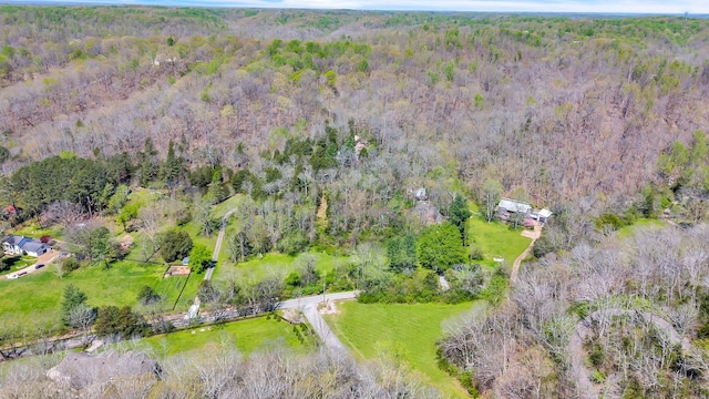 bird's eye view with a forest view